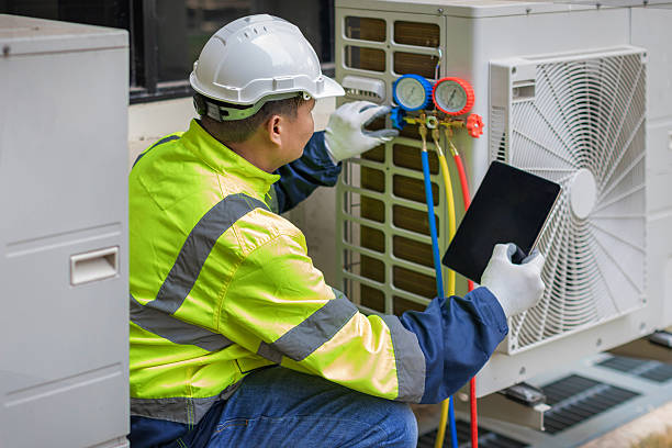 Professional Hvac Maintenance technician working in Hampton, NH